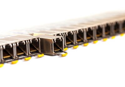 Row of Internet SFP (Small Form-factor Pluggable)  network modules for network switch. Close up. Isolated.